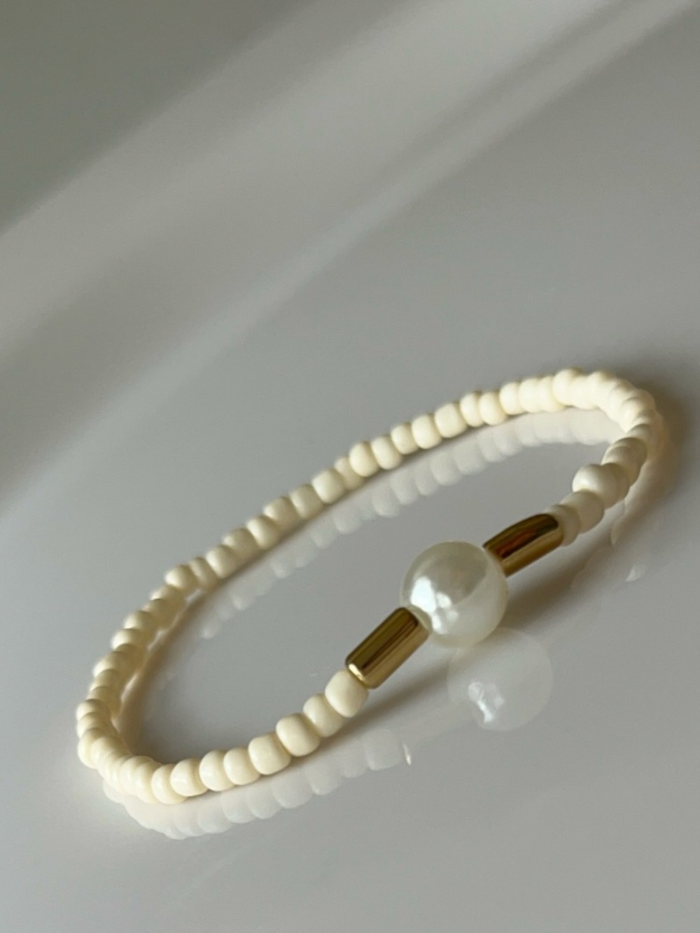 Cream Beaded Stretch Bracelet with Pearl Accent